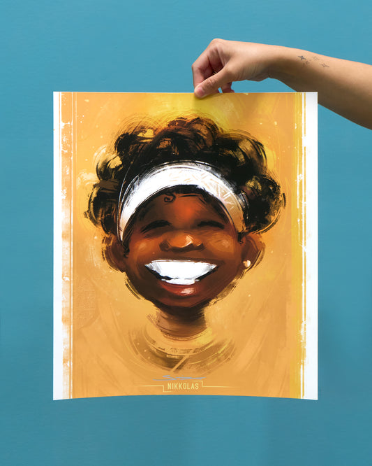 Hand holding a poster of a smiling child with a headband against a blue background